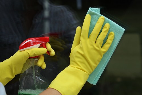 Carpet cleaning technician preparing professional equipment