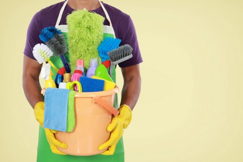 Carpet cleaning team preparing equipment safely before starting work