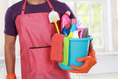 Customer raising a carpet cleaning complaint with service records nearby