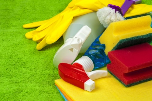 Worker controlling spills and maintaining a safe cleaning workspace